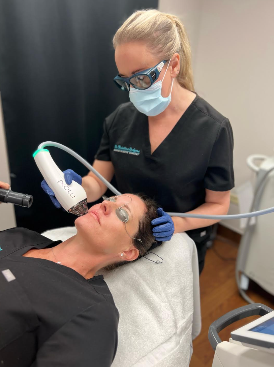 Physician performing laser procedure
