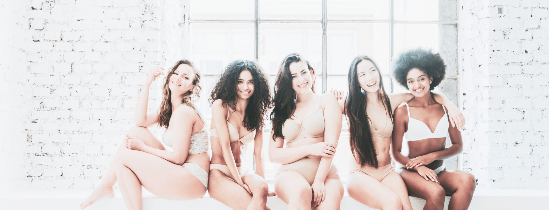 five women with various body shapes pose in undergarments Dr. Christine Rodgers Denver Plastic Surgery